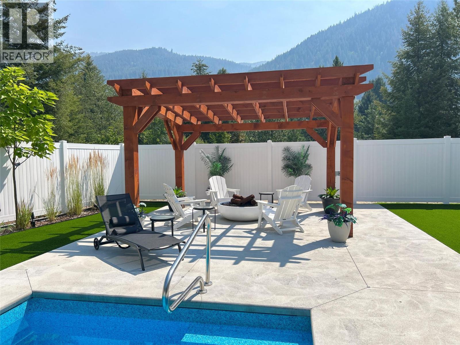 1217 Mcphee Road, Castlegar, BC - Outdoor With In Ground Pool With Deck Patio Veranda