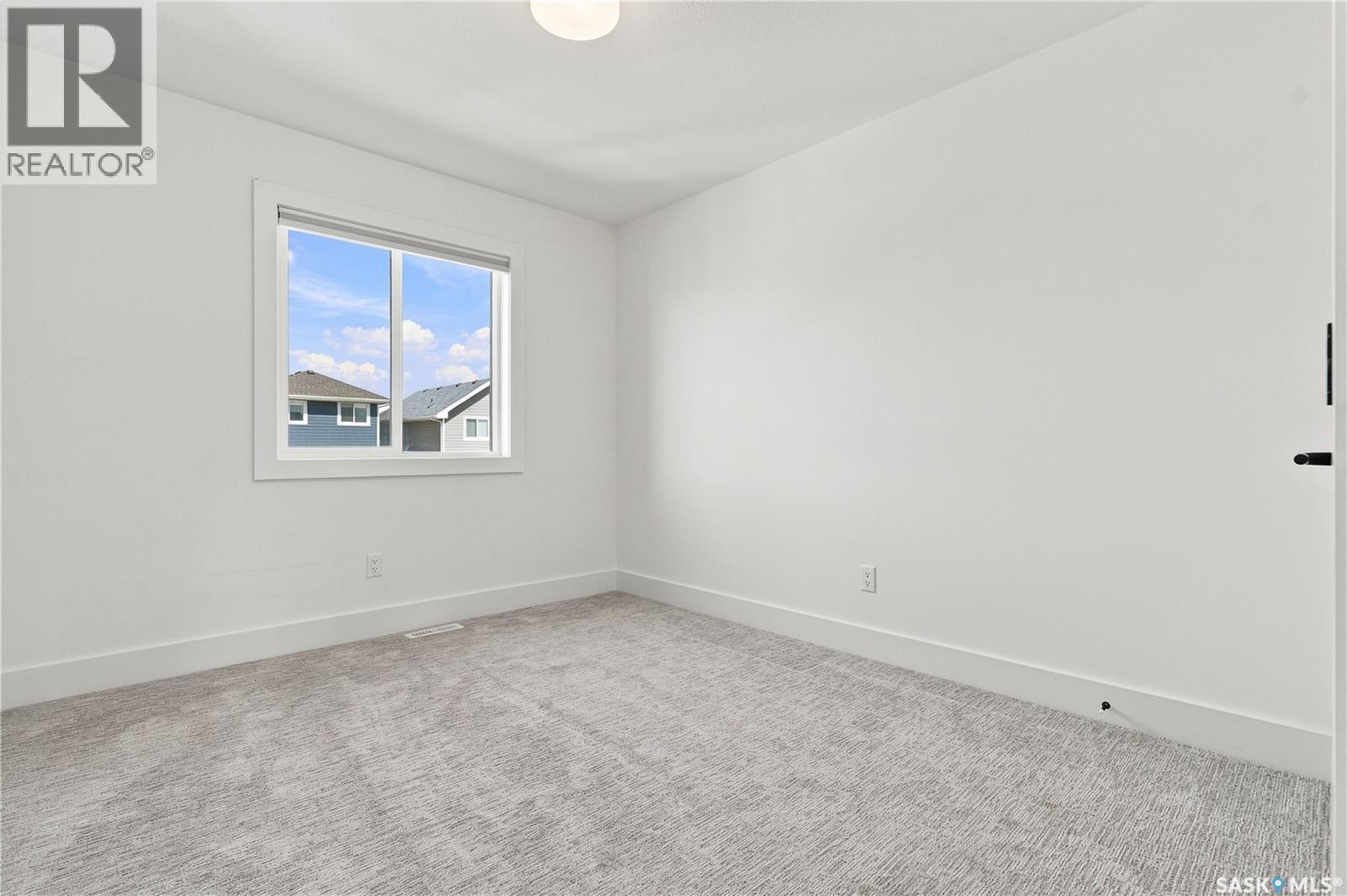 115 Rosewood Boulevard E, Saskatoon, SK - Indoor Photo Showing Other Room
