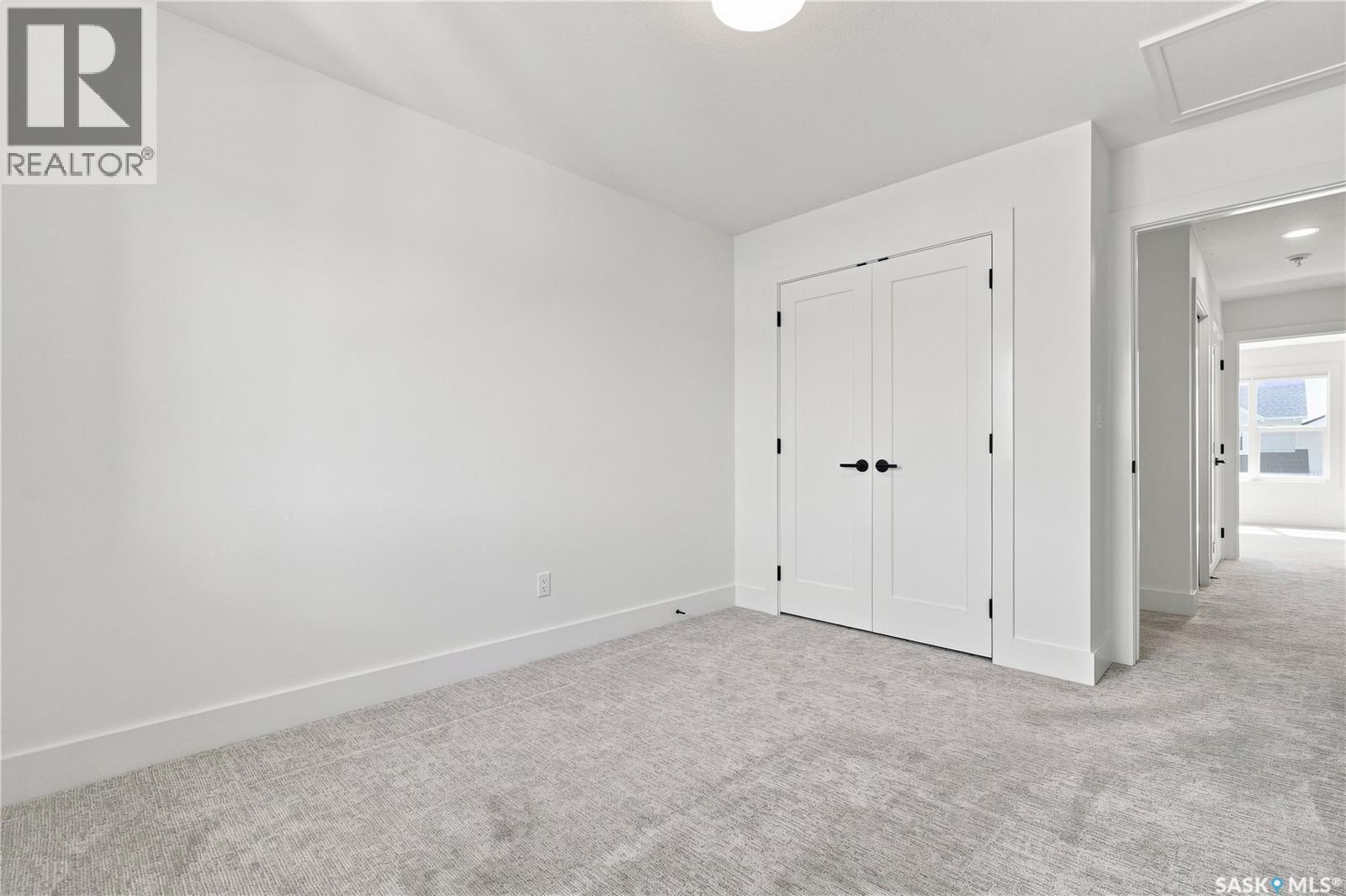 115 Rosewood Boulevard E, Saskatoon, SK - Indoor Photo Showing Other Room