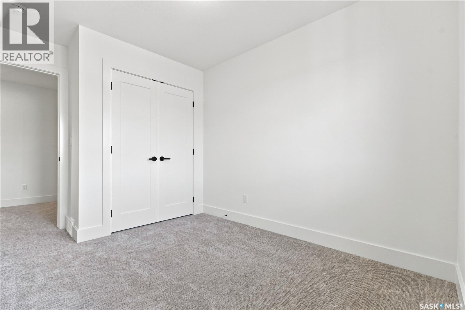 115 Rosewood Boulevard E, Saskatoon, SK - Indoor Photo Showing Other Room
