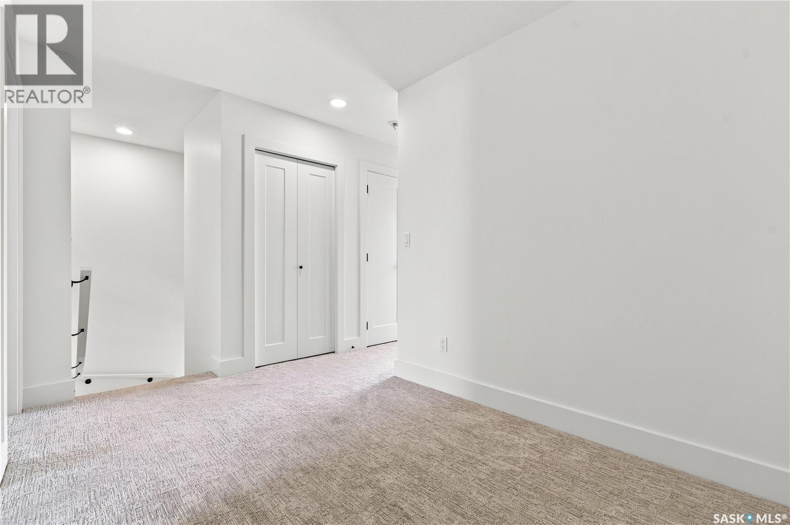 115 Rosewood Boulevard E, Saskatoon, SK - Indoor Photo Showing Other Room