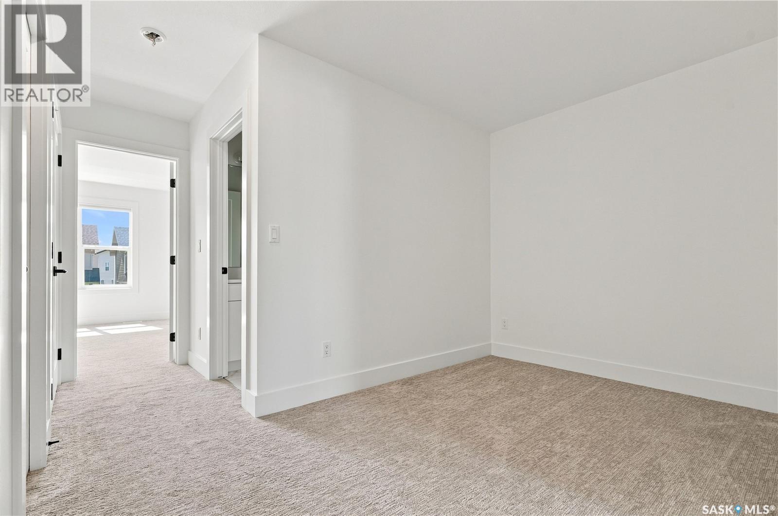 115 Rosewood Boulevard E, Saskatoon, SK - Indoor Photo Showing Other Room
