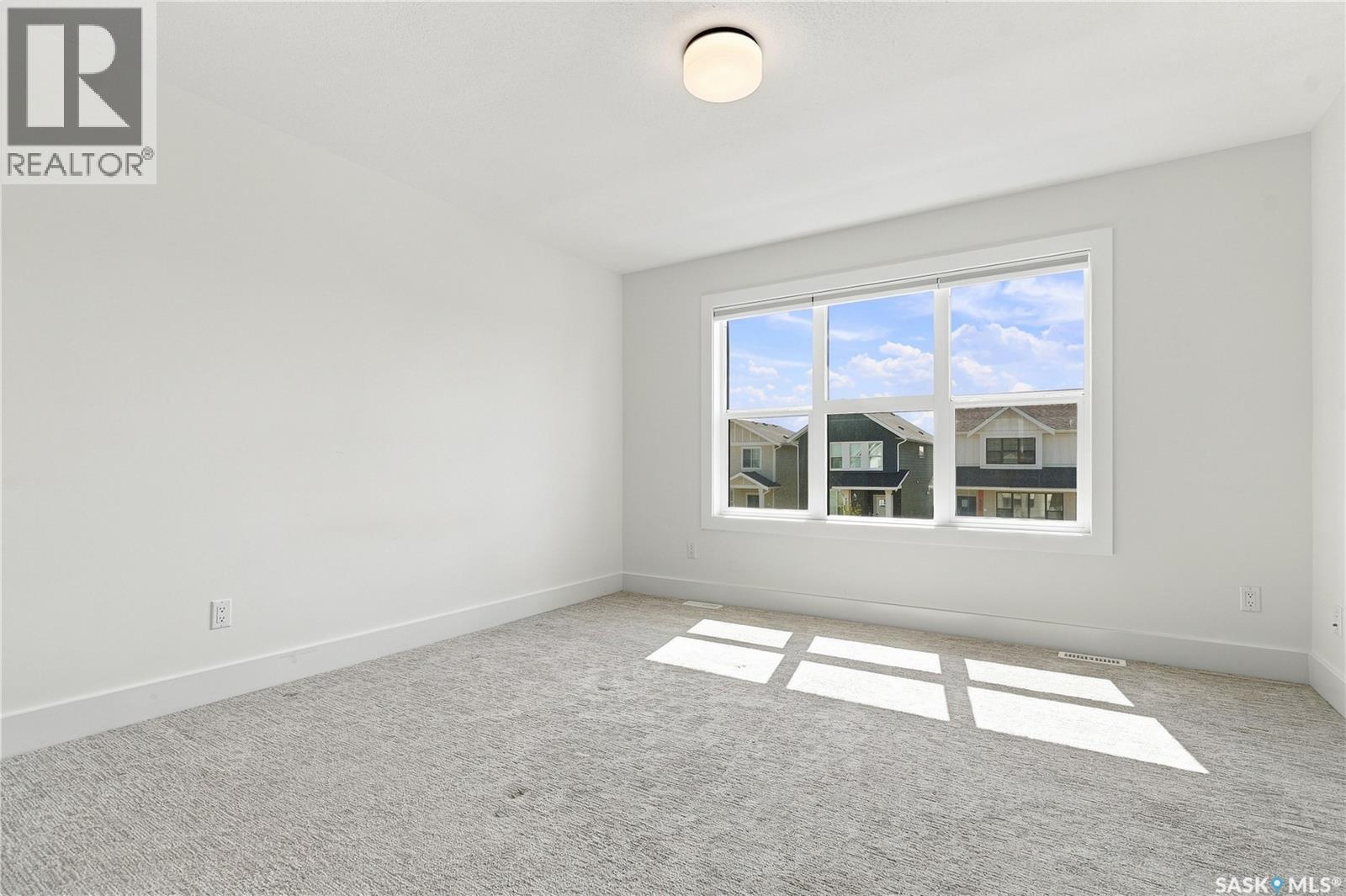 115 Rosewood Boulevard E, Saskatoon, SK - Indoor Photo Showing Other Room