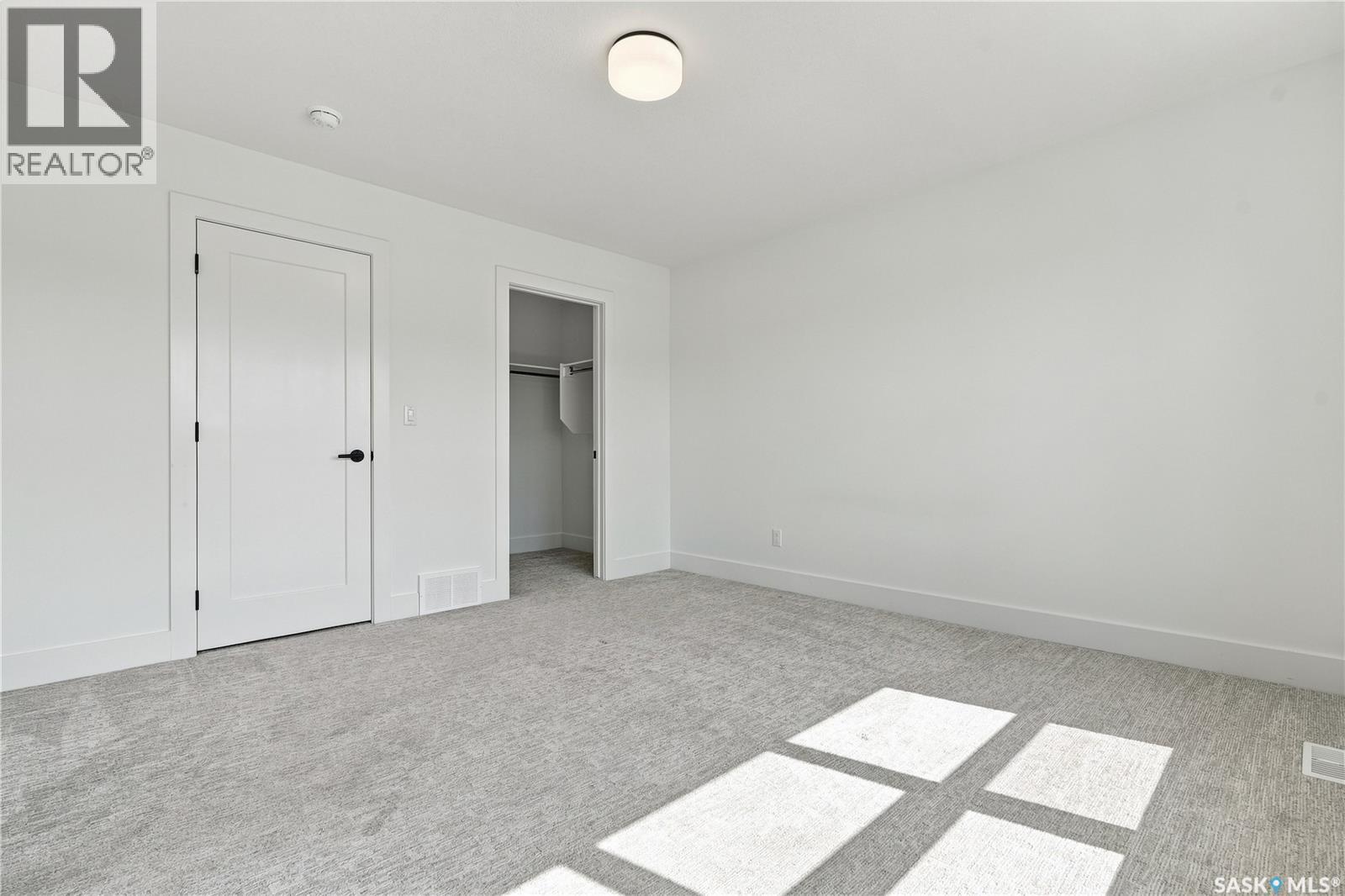 115 Rosewood Boulevard E, Saskatoon, SK - Indoor Photo Showing Other Room
