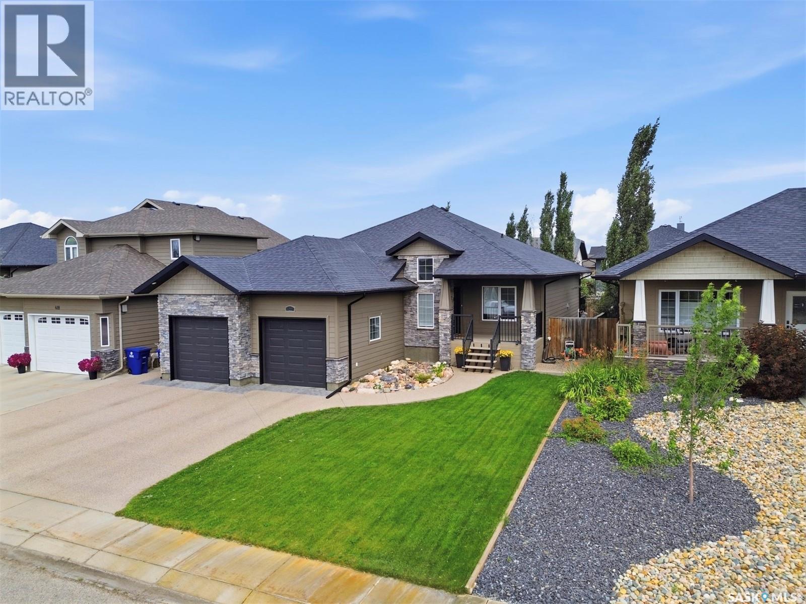 420 Hogan Way, Warman, SK - Outdoor With Facade