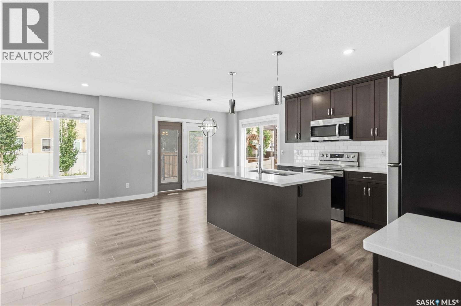 139 Dagnone Lane, Saskatoon, SK - Indoor Photo Showing Kitchen With Upgraded Kitchen