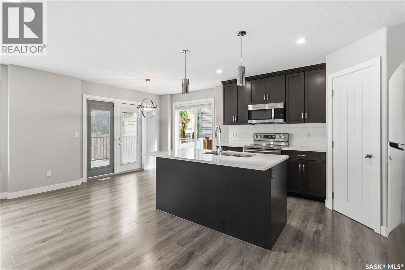 139 Dagnone Lane, Saskatoon, SK - Indoor Photo Showing Kitchen With Upgraded Kitchen