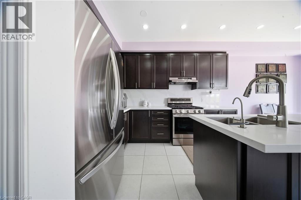 166 Deerpath Drive Unit# 32, Guelph, ON - Indoor Photo Showing Kitchen With Stainless Steel Kitchen With Double Sink With Upgraded Kitchen