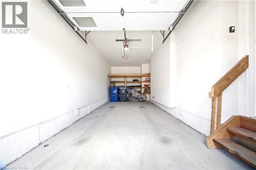 166 Deerpath Drive Unit# 32, Guelph, ON - Indoor Photo Showing Garage