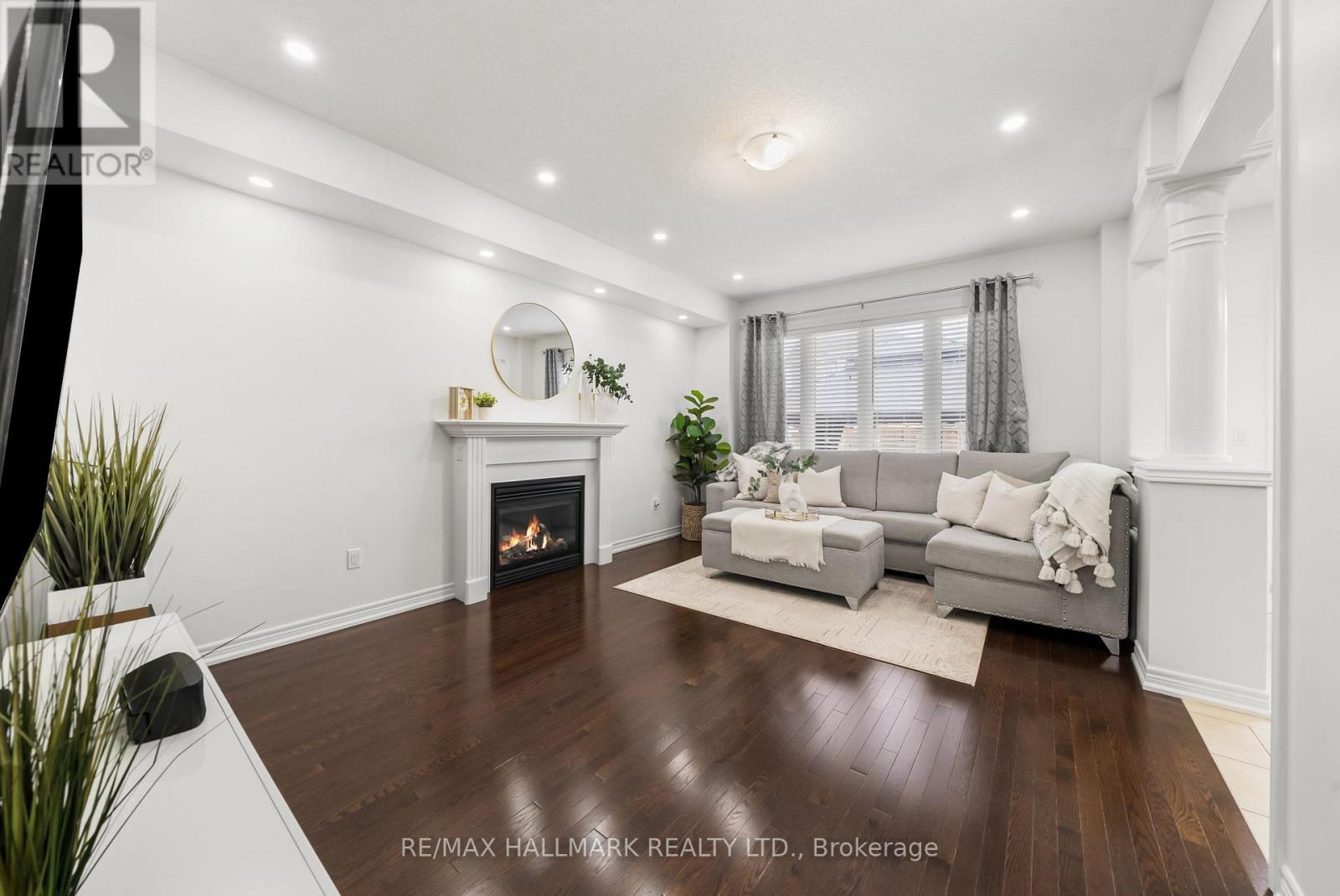 great room architecture ideal for entertainers. - 152 Mcdonald Crescent, Clarington, ON - Indoor Photo Showing Living Room With Fireplace