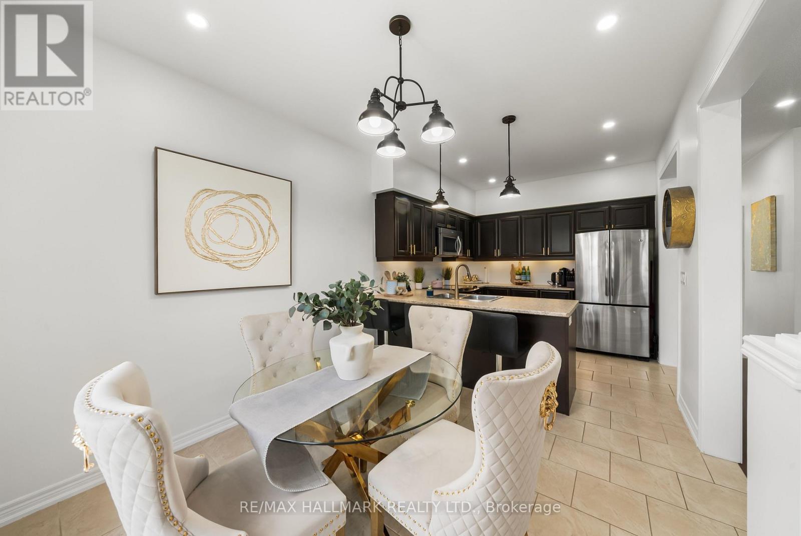 updated pendant lighting over sink and breakfast - 152 Mcdonald Crescent, Clarington, ON - Indoor Photo Showing Dining Room