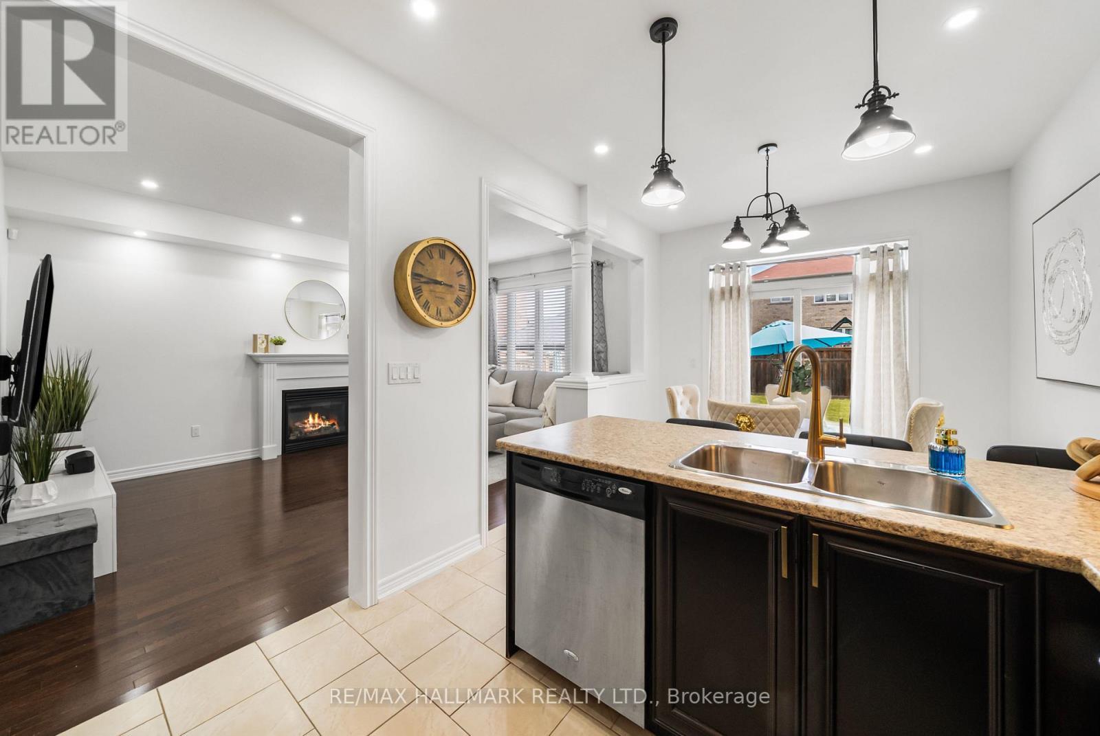 152 Mcdonald Crescent, Clarington, ON - Indoor Photo Showing Kitchen With Fireplace With Double Sink