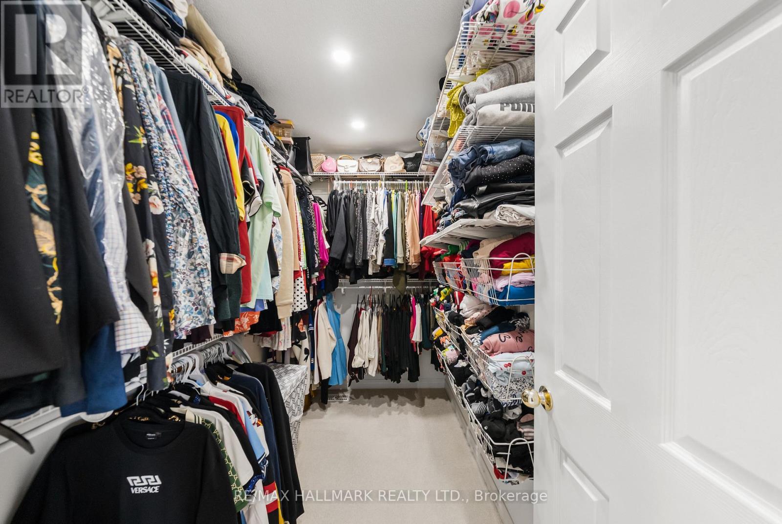 Large Walk In Closet with organizers. - 152 Mcdonald Crescent, Clarington, ON - Indoor With Storage