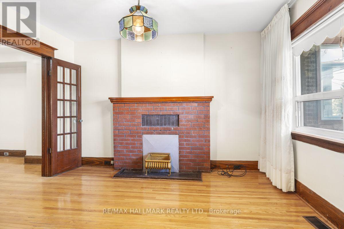 511 Northcliffe Boulevard, Toronto, ON - Indoor Photo Showing Other Room With Fireplace