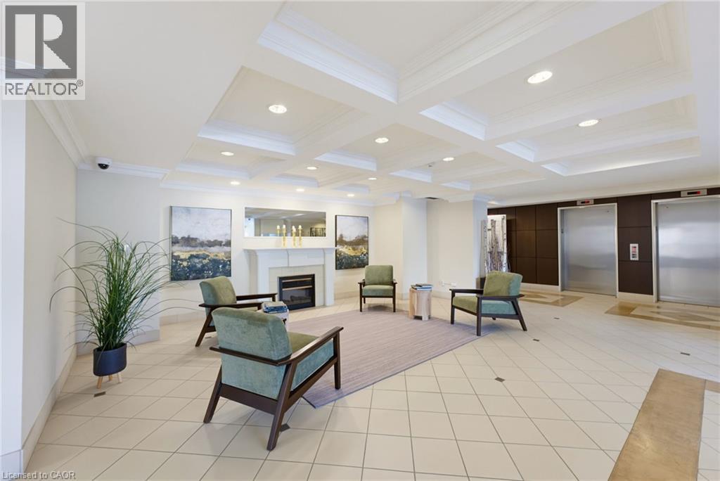 2000 Creekside Drive Unit# 605, Dundas, ON - Indoor With Fireplace