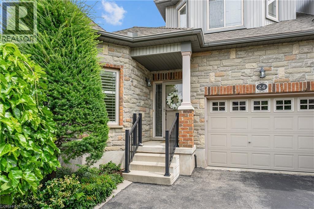 Stone veneer facade featuring a covered entry - 24 Knack Lane, Cambridge, ON - Outdoor