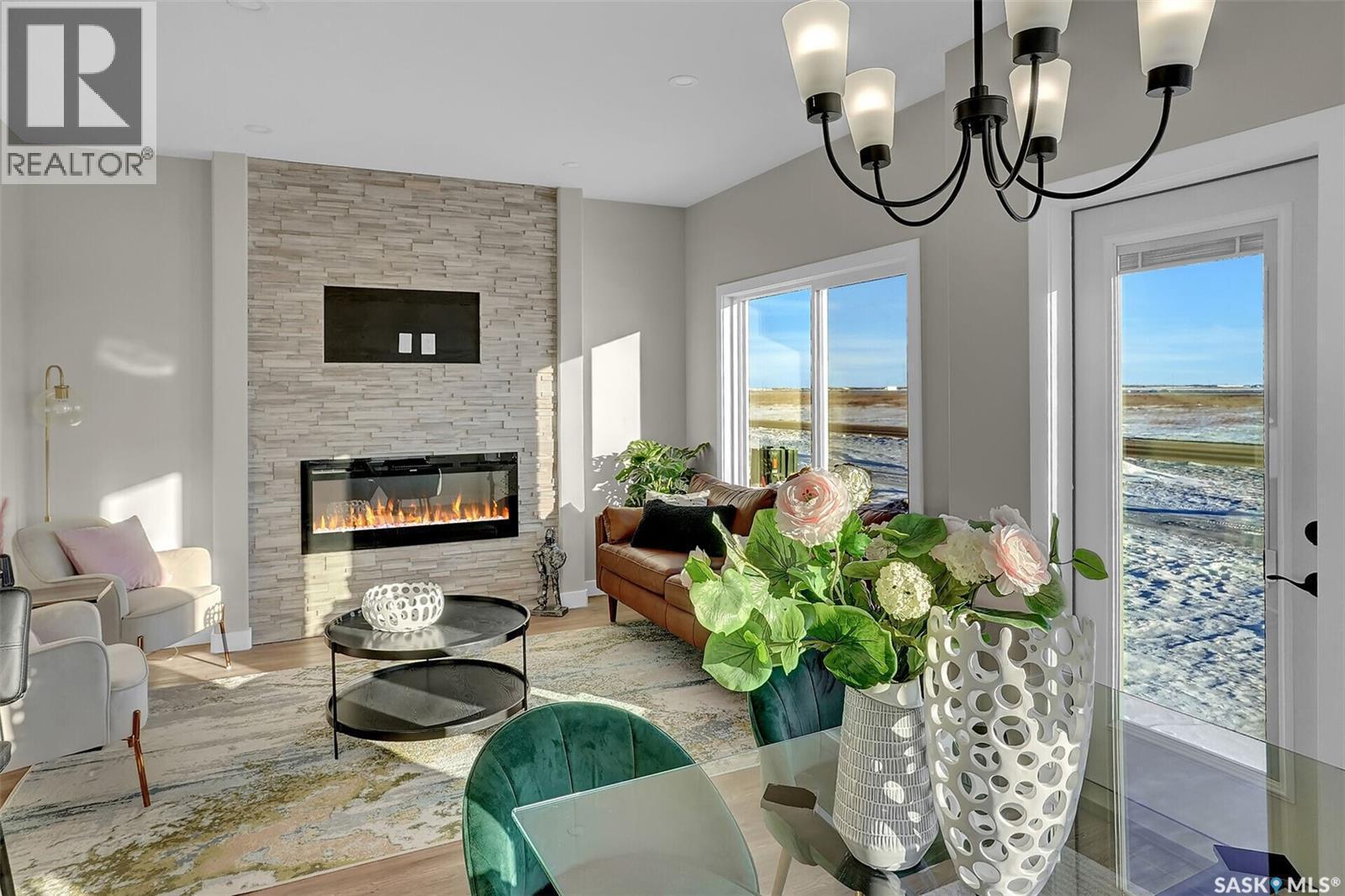 3005 Green Turtle Road, Regina, SK - Indoor Photo Showing Living Room With Fireplace