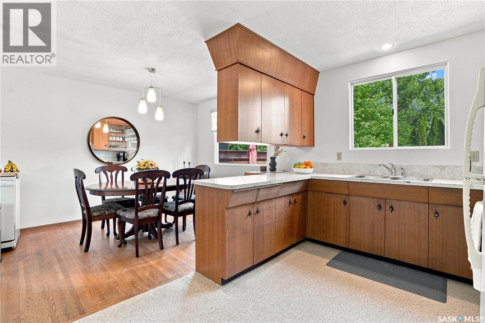 57 Potter Crescent, Saskatoon, SK - Indoor Photo Showing Kitchen With Double Sink