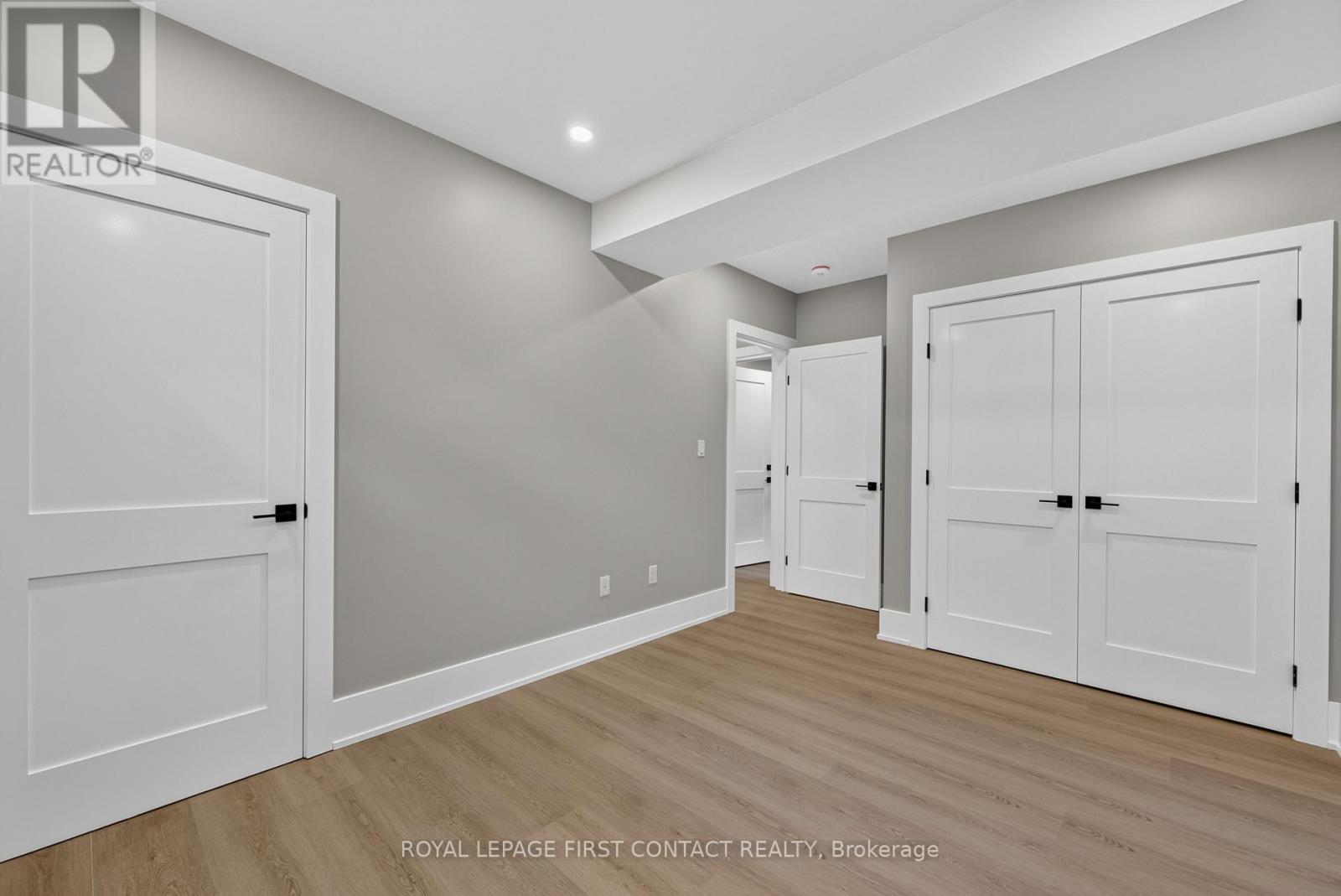 Bedroom 1 2 closets - Lower - 929 7Th Line, Innisfil, ON - Indoor Photo Showing Other Room