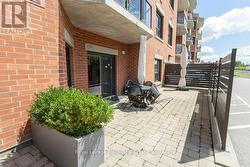 Unit 103 walkout to private Ground-level terrace - 