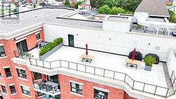 2 of 2  Rooftop Patios - 