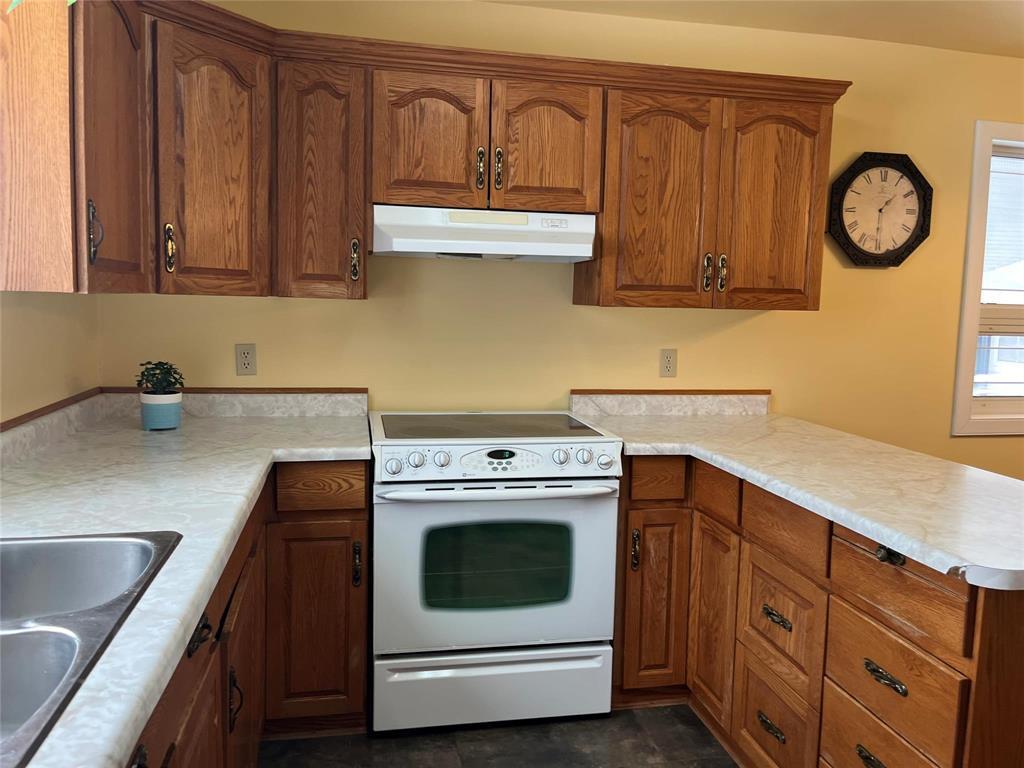 194 3Rd Avenue, Benito, MB - Indoor Photo Showing Kitchen With Double Sink