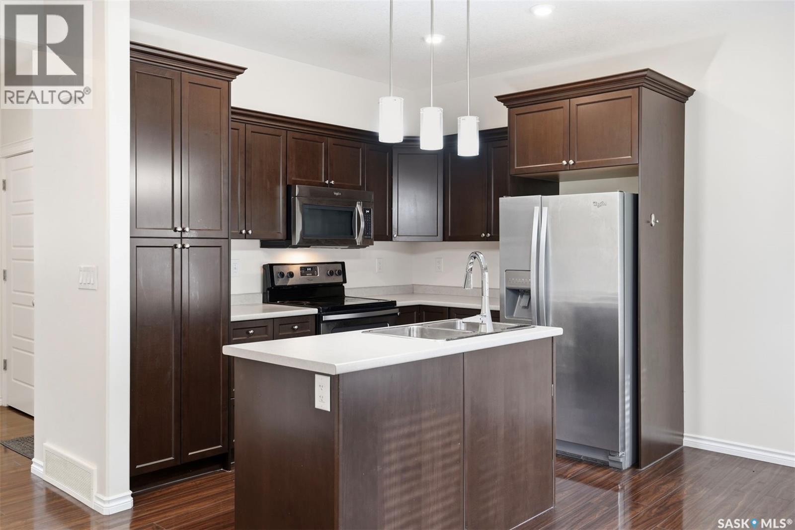 2 115 Veltkamp Crescent, Saskatoon, SK - Indoor Photo Showing Kitchen With Double Sink With Upgraded Kitchen