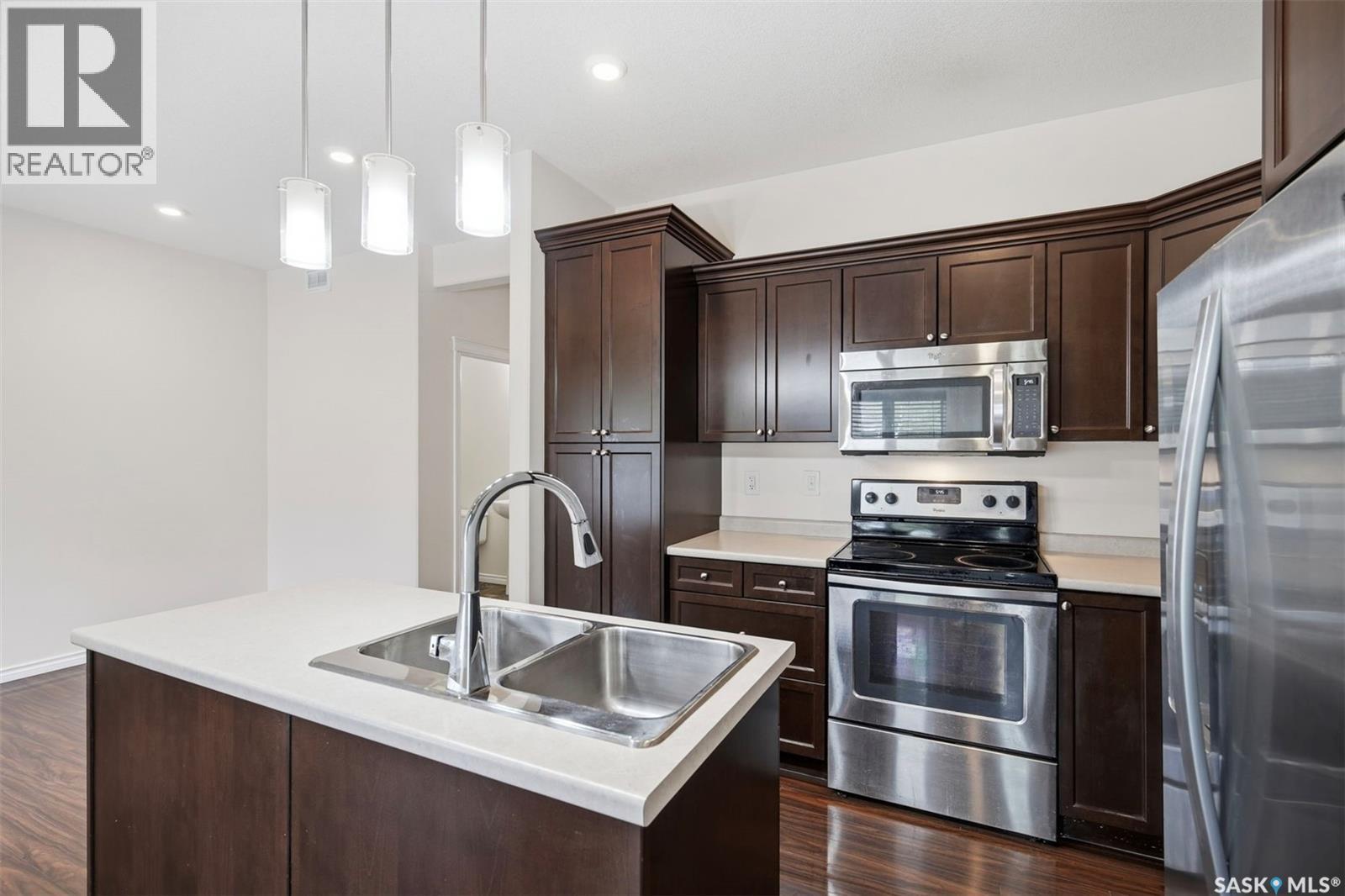 2 115 Veltkamp Crescent, Saskatoon, SK - Indoor Photo Showing Kitchen With Double Sink With Upgraded Kitchen