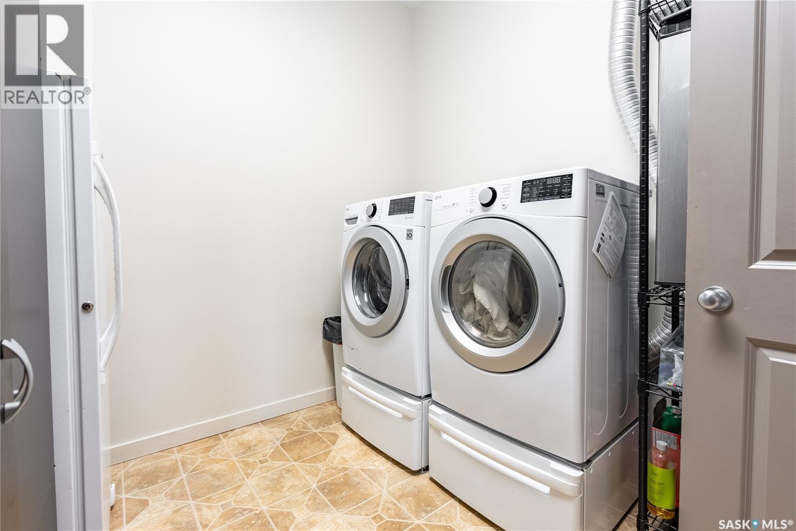 206 211 D Avenue N, Saskatoon, SK - Indoor Photo Showing Laundry Room