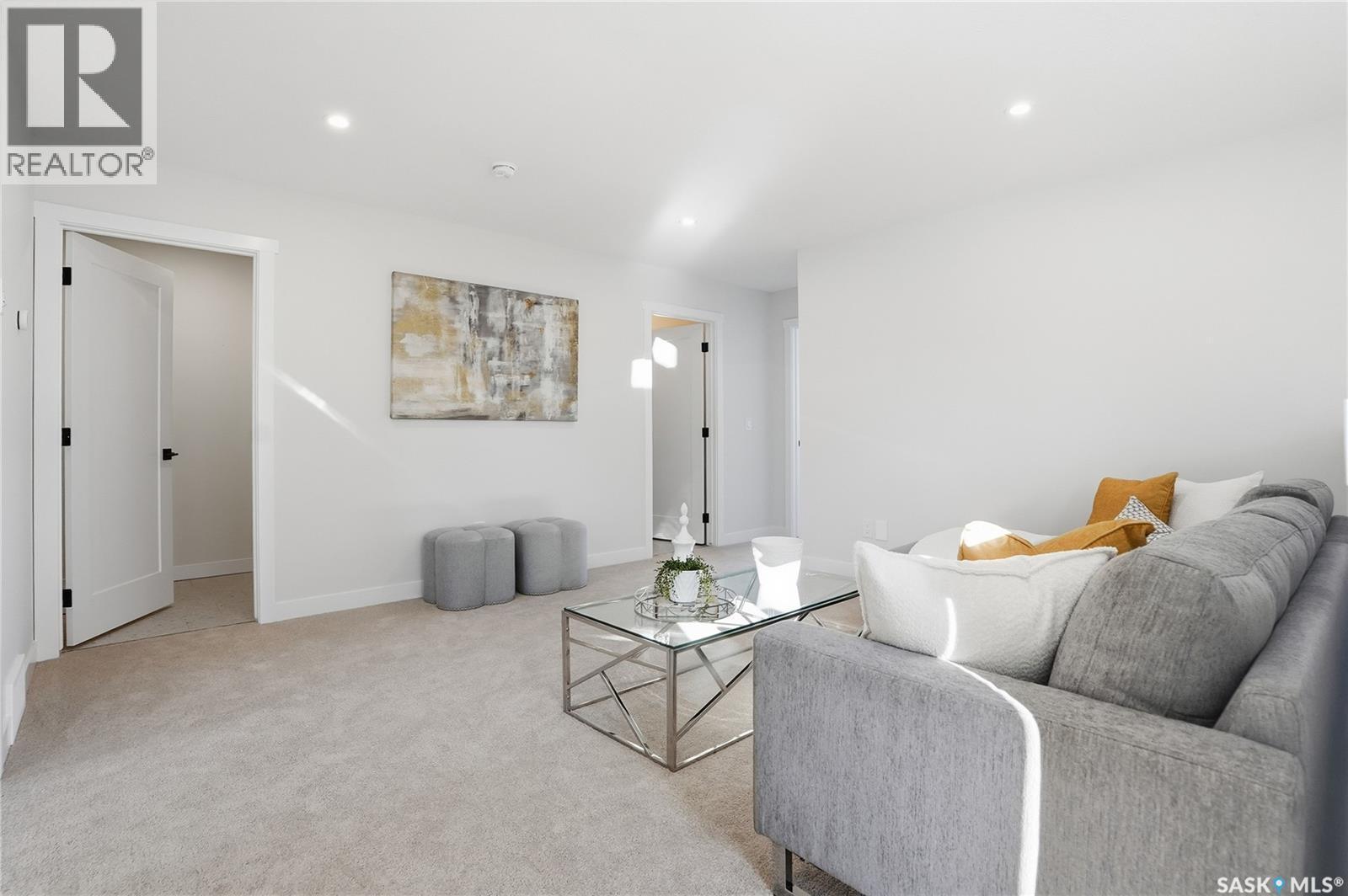 211 Amisk Way, Saskatoon, SK - Indoor Photo Showing Living Room