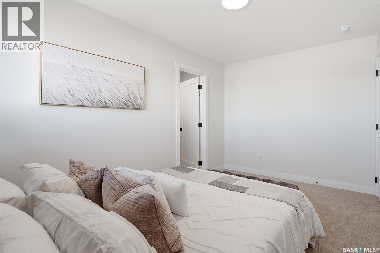 211 Amisk Way, Saskatoon, SK - Indoor Photo Showing Bedroom