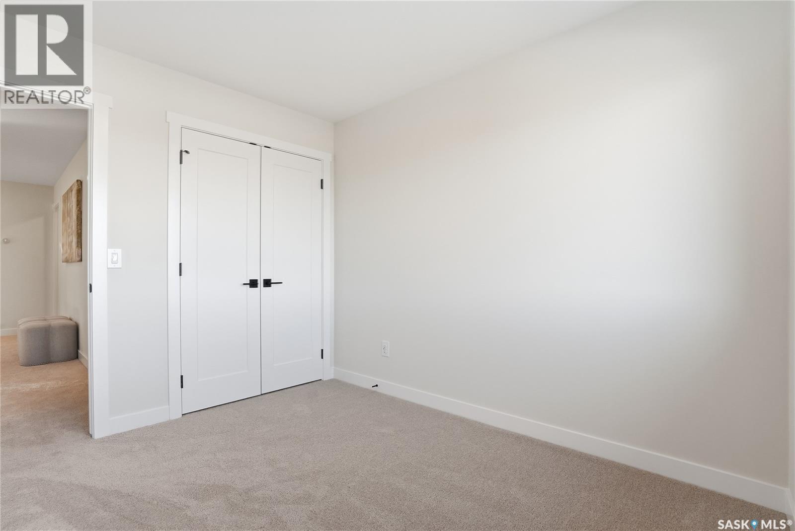 211 Amisk Way, Saskatoon, SK - Indoor Photo Showing Other Room