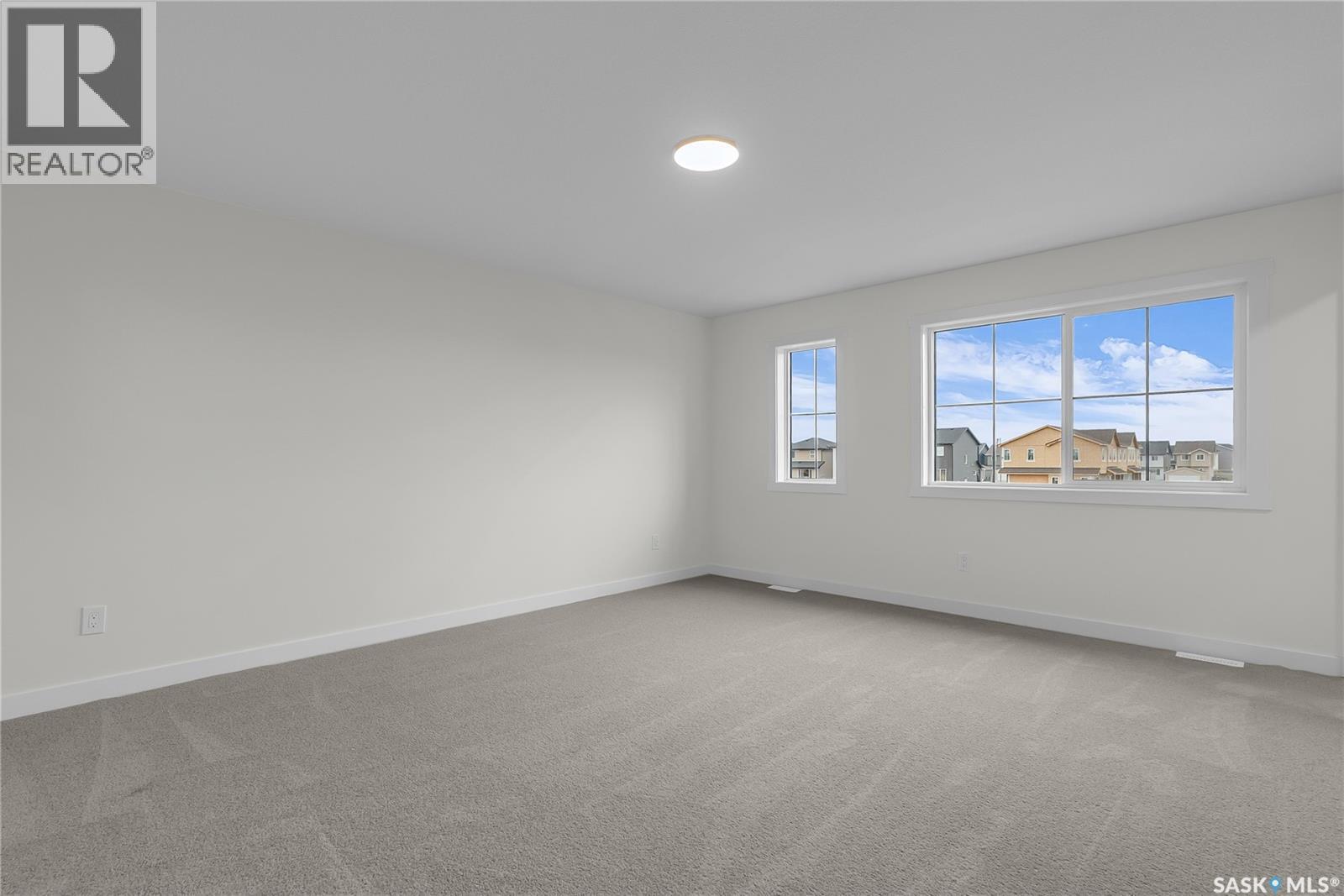 207 Amisk Way, Saskatoon, SK - Indoor Photo Showing Other Room