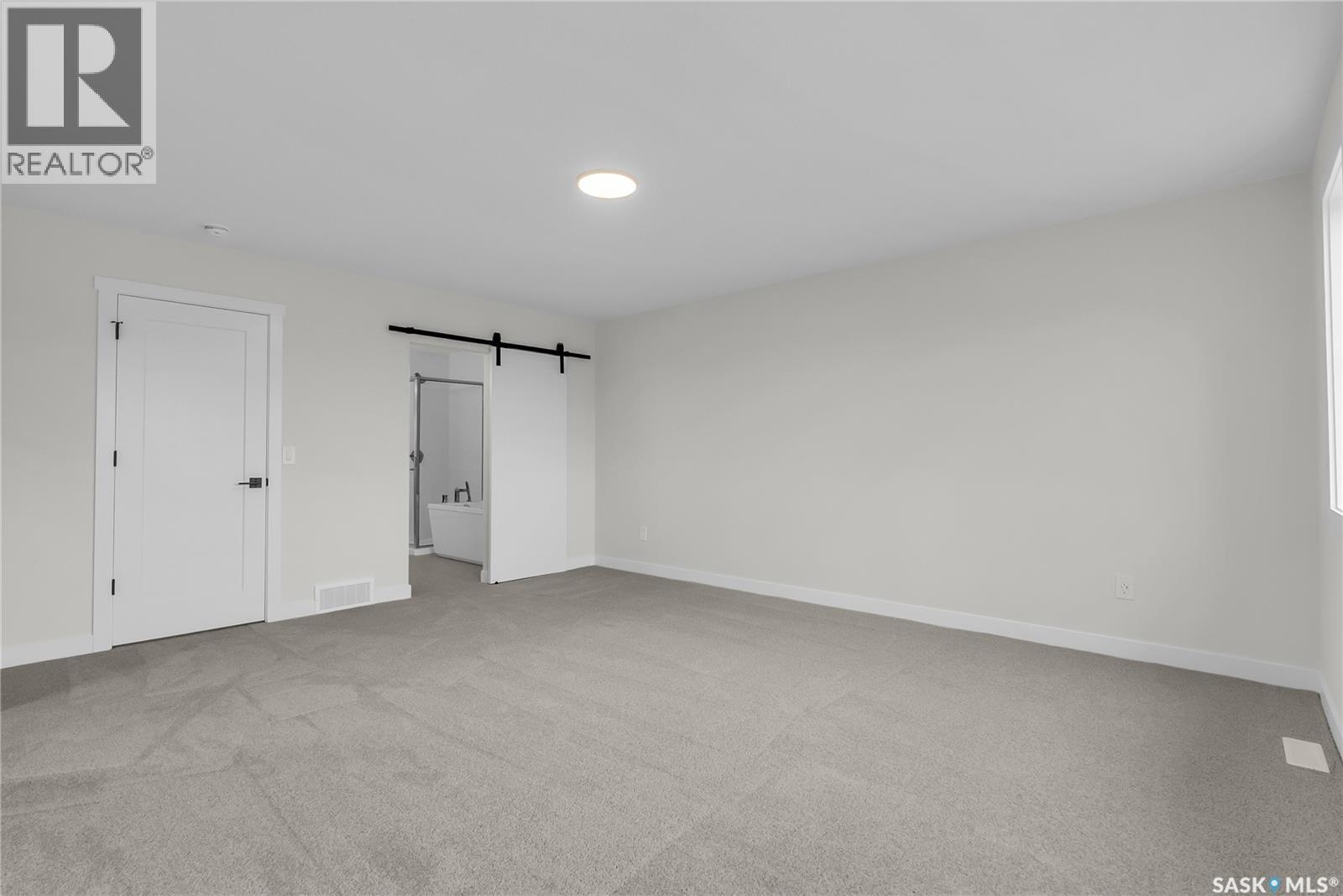 207 Amisk Way, Saskatoon, SK - Indoor Photo Showing Other Room