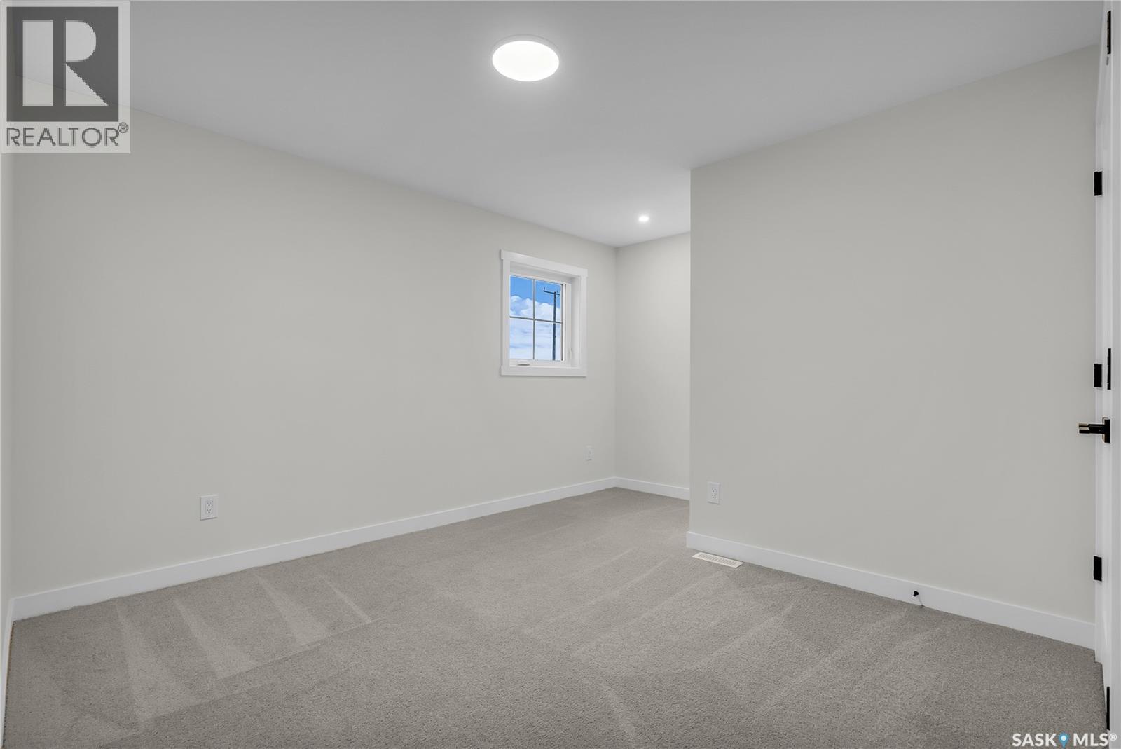 207 Amisk Way, Saskatoon, SK - Indoor Photo Showing Other Room