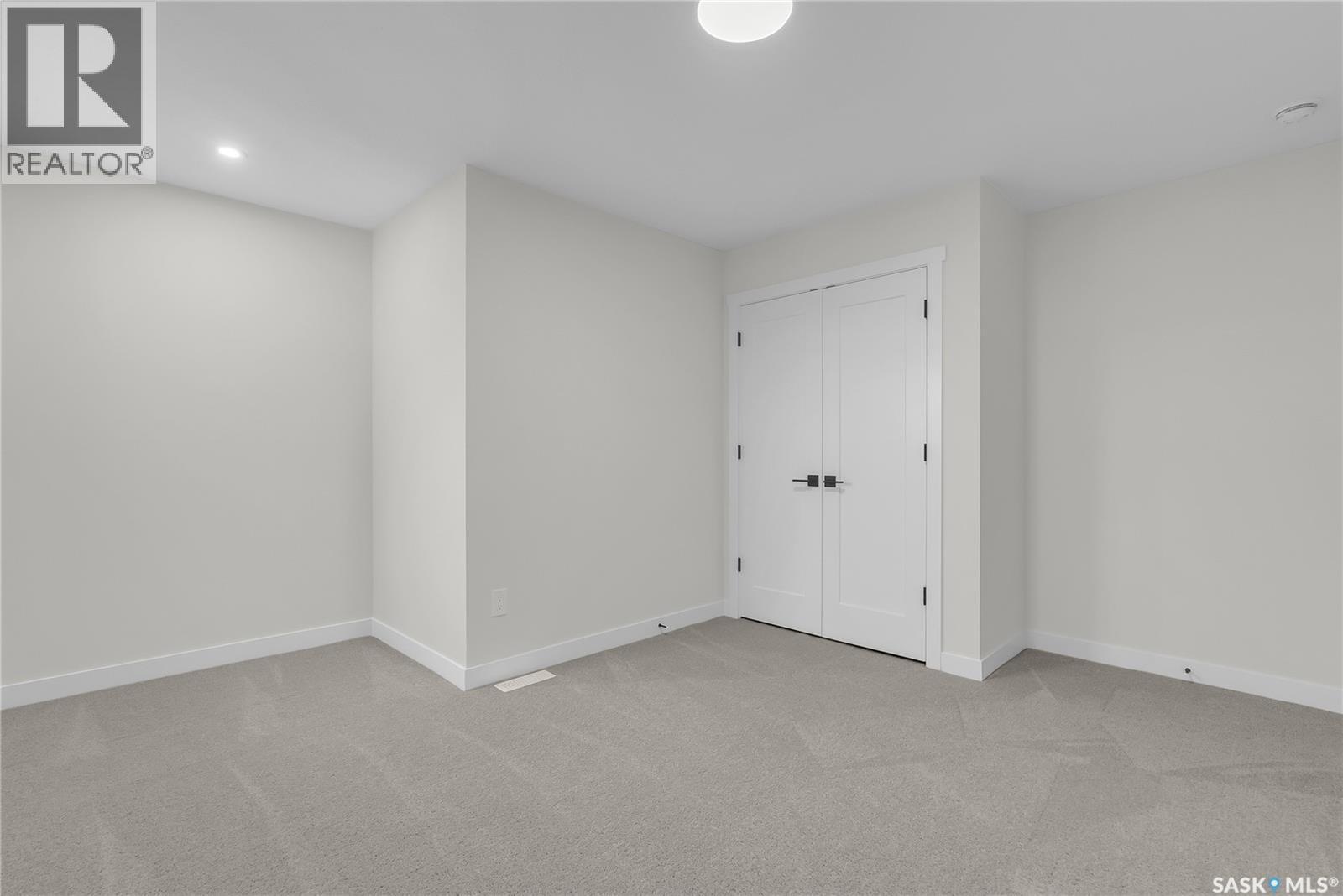 207 Amisk Way, Saskatoon, SK - Indoor Photo Showing Other Room