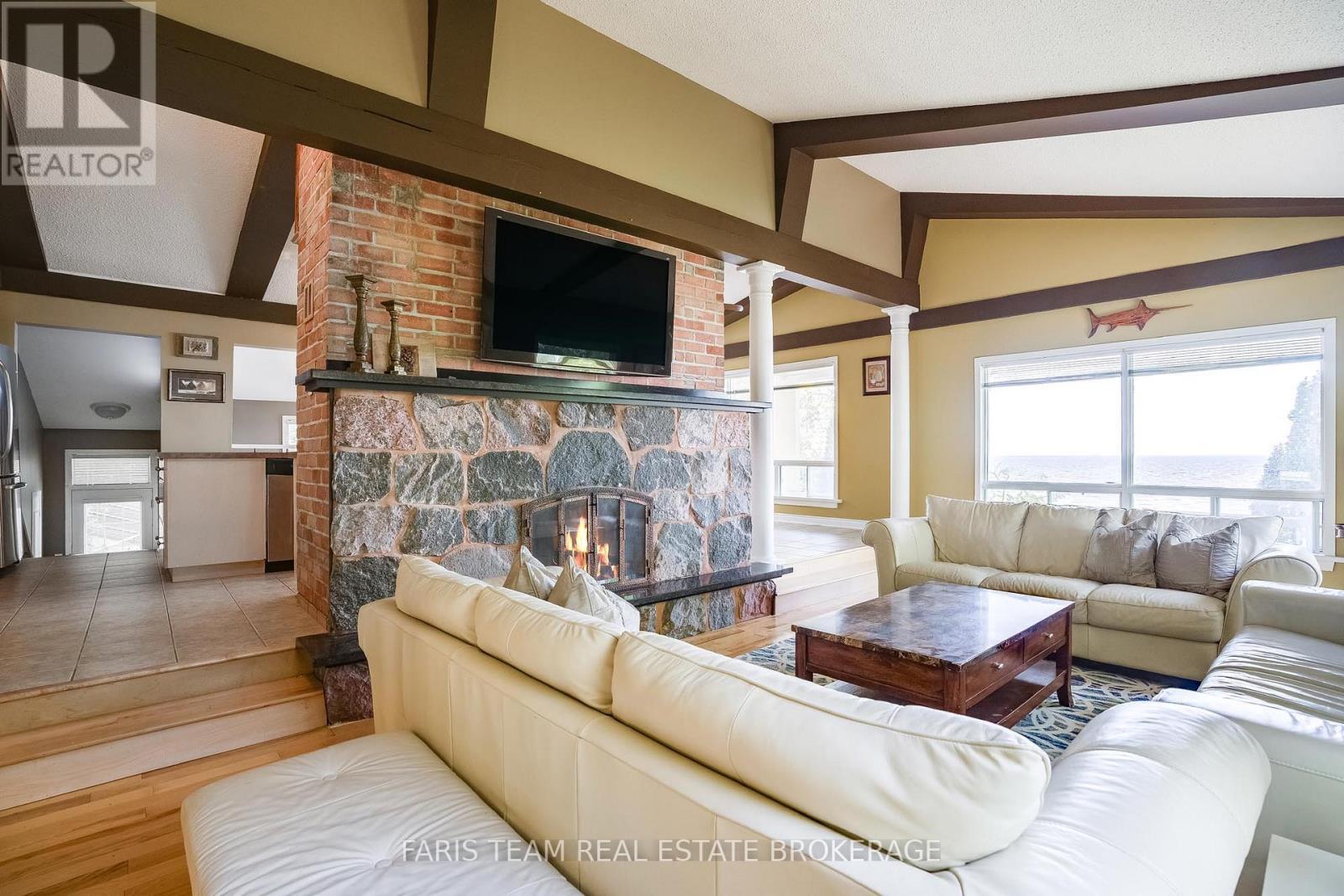 1787 Champlain Road, Tiny, ON - Indoor Photo Showing Living Room With Fireplace