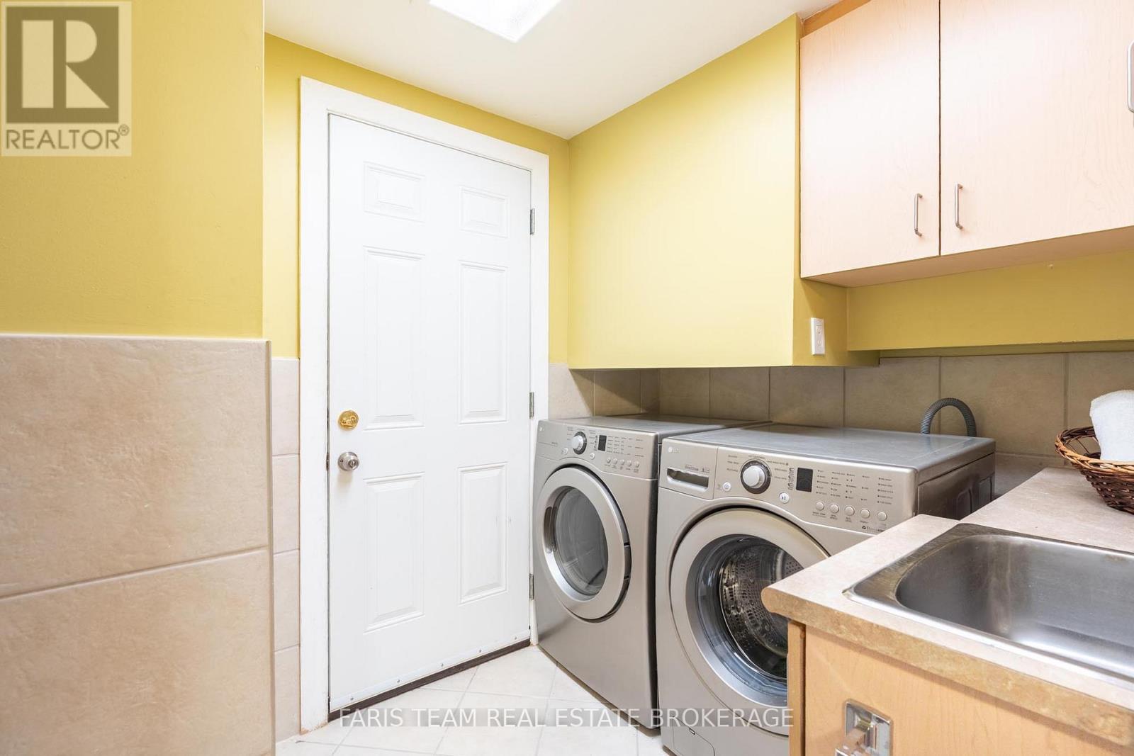 1787 Champlain Road, Tiny, ON - Indoor Photo Showing Laundry Room