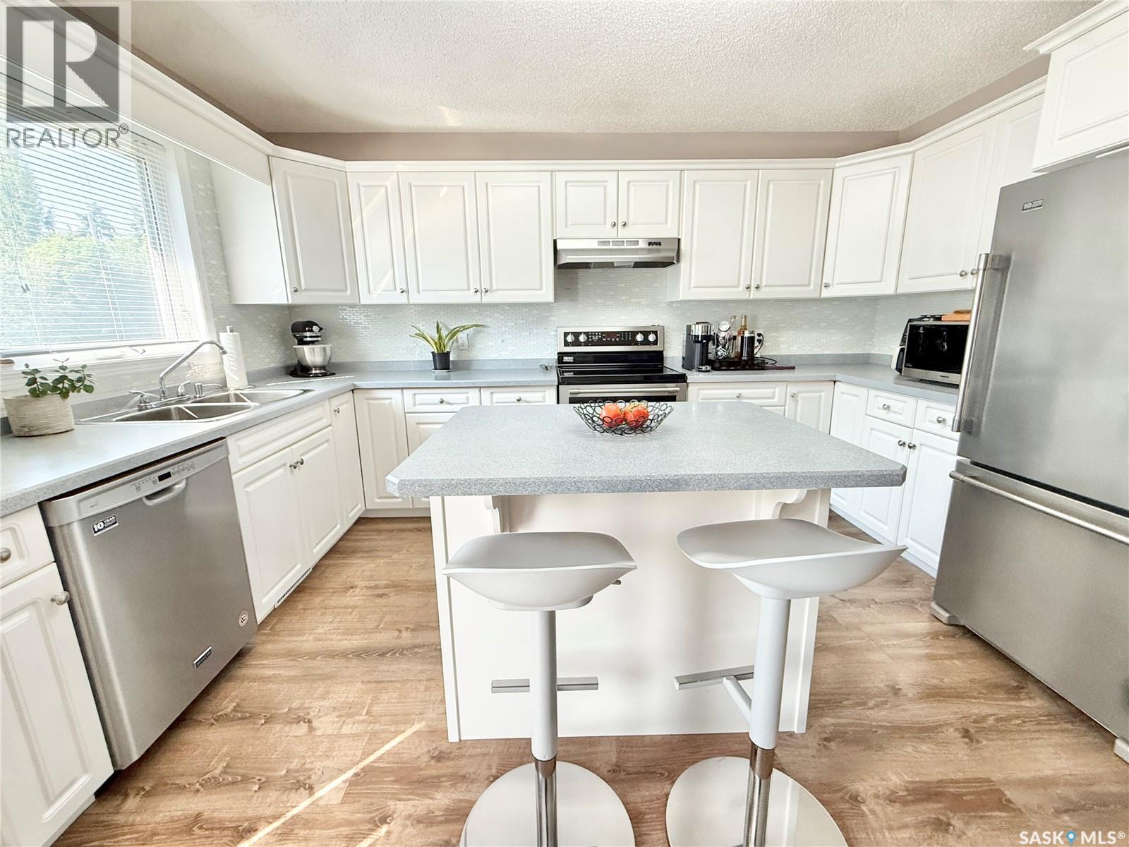 301 Rosher Street, Colonsay, SK - Indoor Photo Showing Kitchen With Double Sink