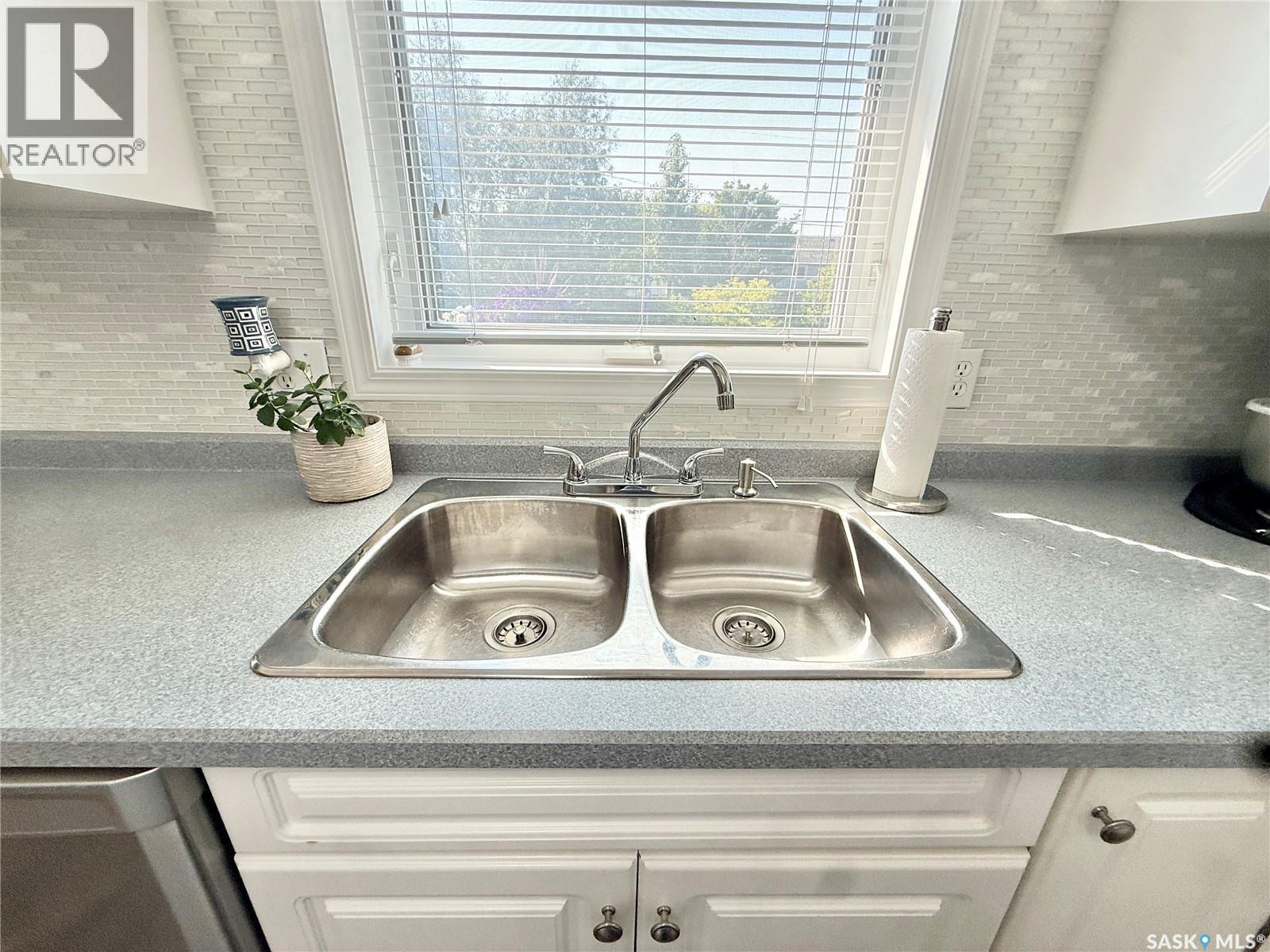 301 Rosher Street, Colonsay, SK - Indoor Photo Showing Kitchen With Double Sink