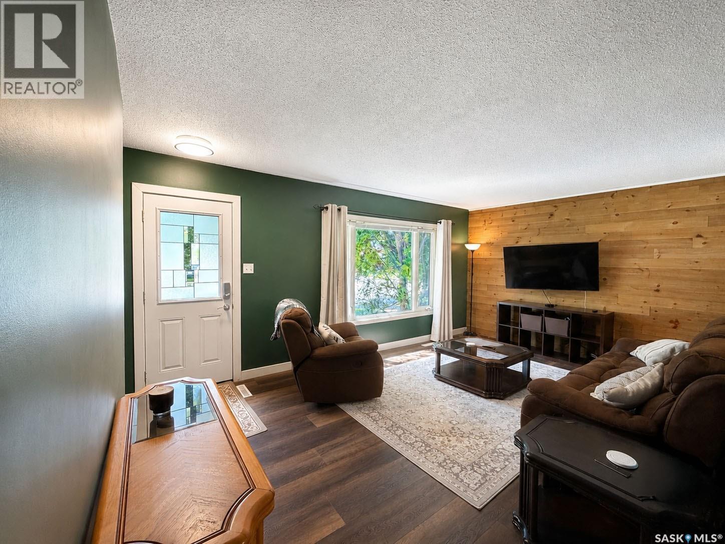 984 Bradshaw Place, Prince Albert, SK - Indoor Photo Showing Living Room With Fireplace