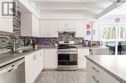 Updated kitchen, stainless steel appliances. - 