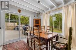 Dining nook, sliding door to side deck in yard - 