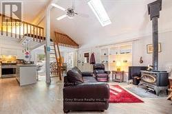 Living Room:, Wood Stove & Skylights - 