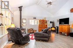 Cozy living room with wood stove AND propane stove - 