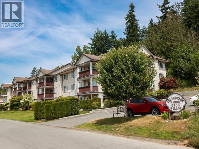 307-5700 Willow Ave, Powell River, BC - Outdoor With Balcony With Facade