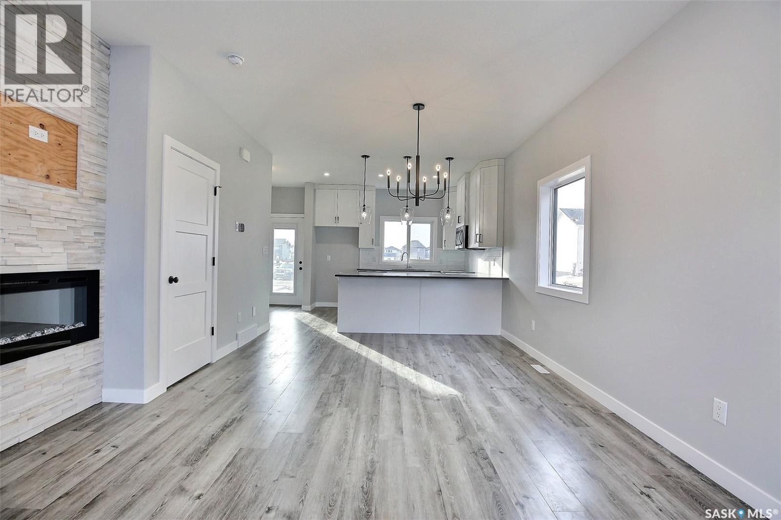 2956 Green Turtle Road, Regina, SK - Indoor With Fireplace