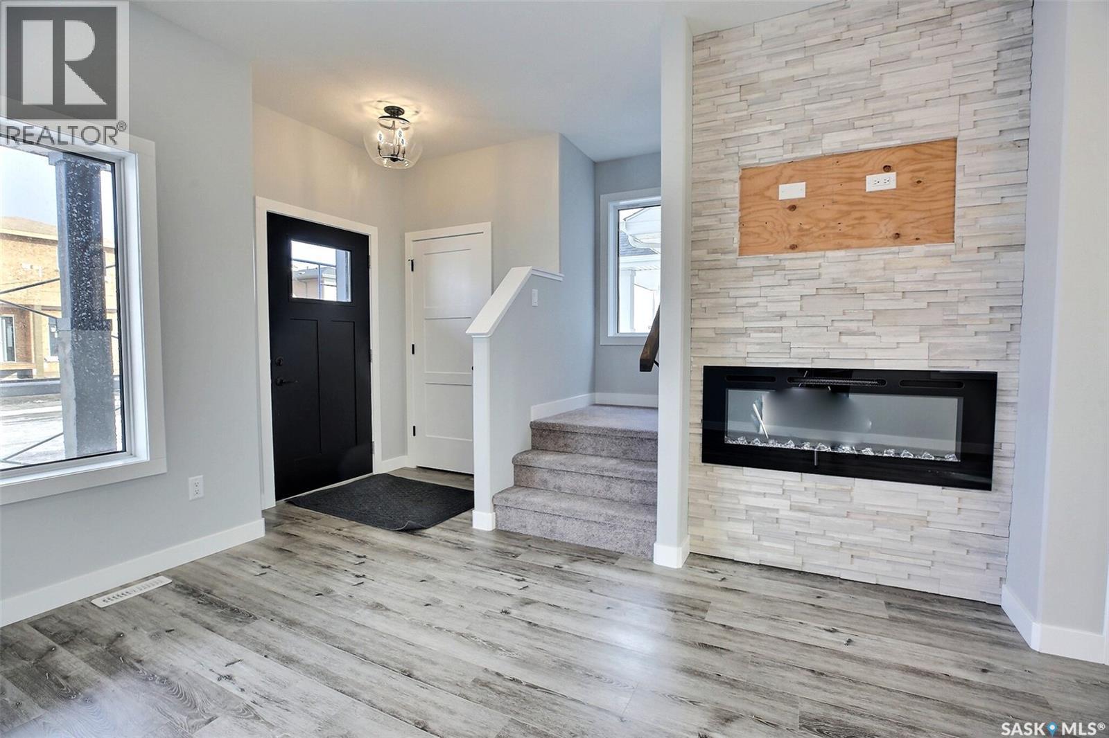 2956 Green Turtle Road, Regina, SK - Indoor With Fireplace