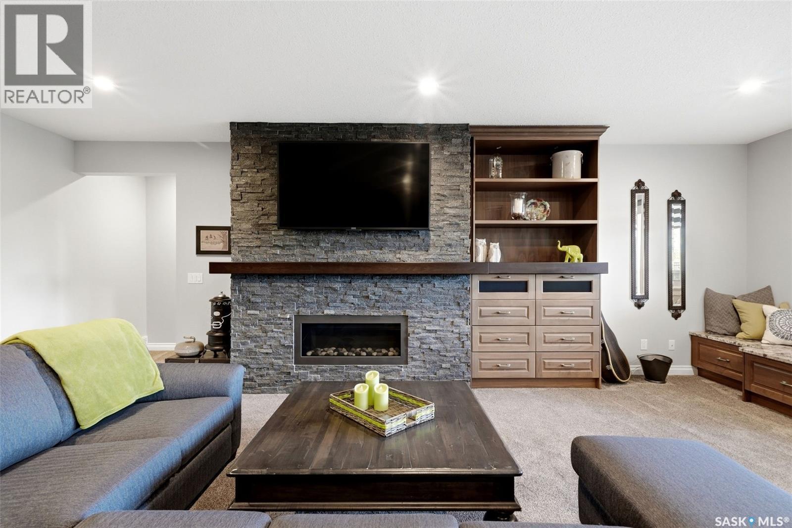 3505 Green Brook Road, Regina, SK - Indoor Photo Showing Living Room With Fireplace