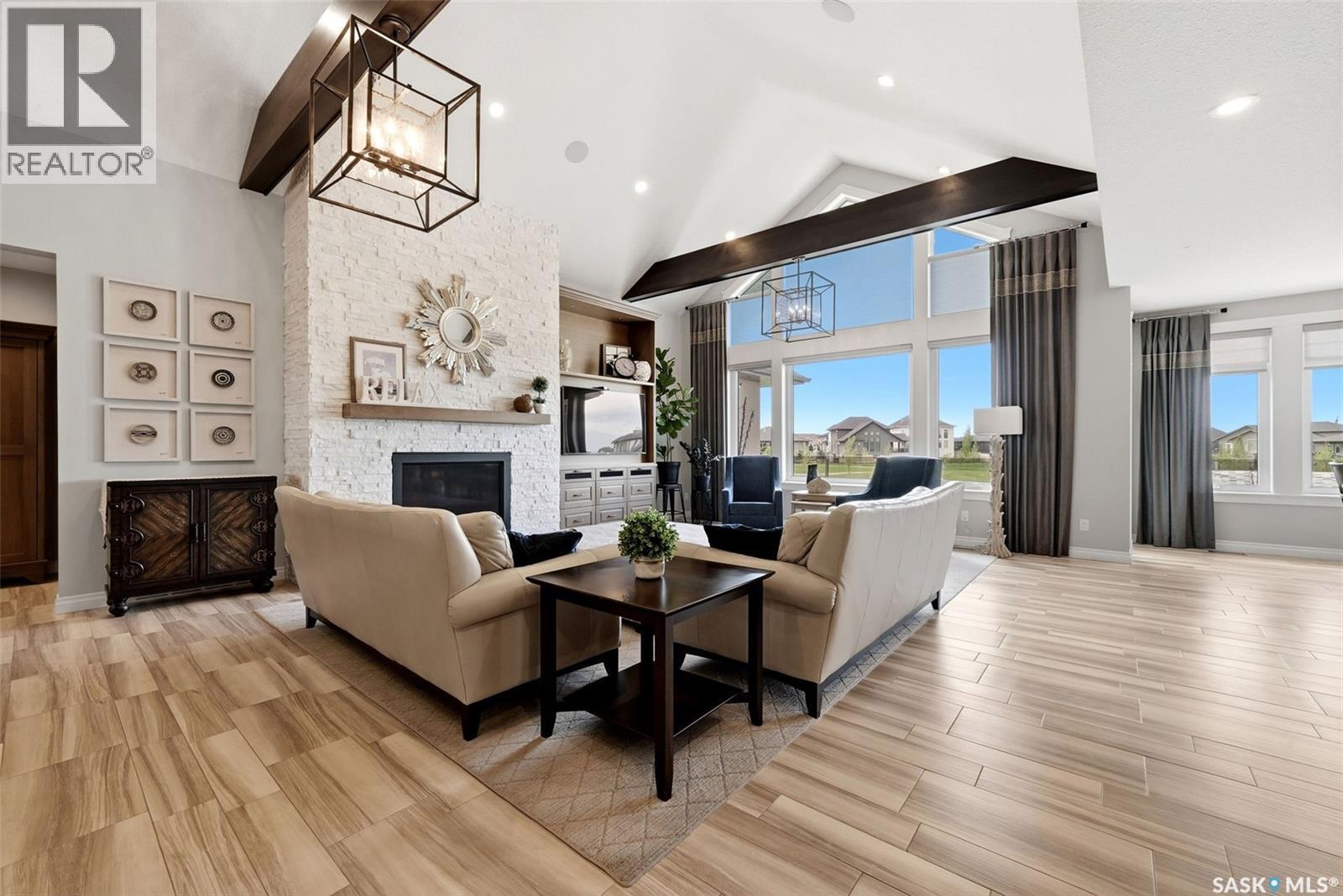 3505 Green Brook Road, Regina, SK - Indoor Photo Showing Living Room With Fireplace